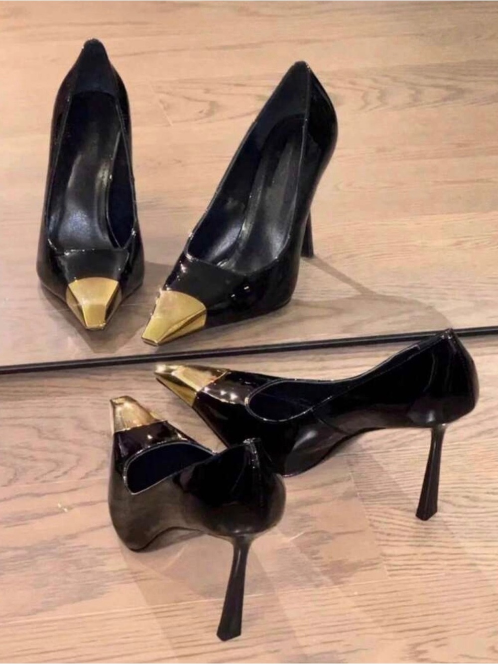 Black Patent Pointed-Toe Pumps with Gold Cap Toe